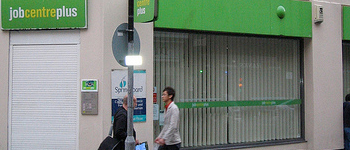 photo of people walking past a Job Centre