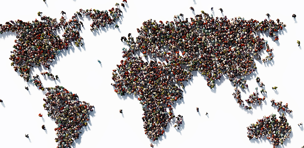 A human crowd forming a world map