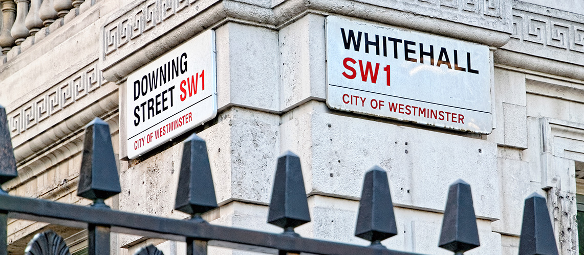 Signs for Whitehall and Downing Street in the City of Westminster
