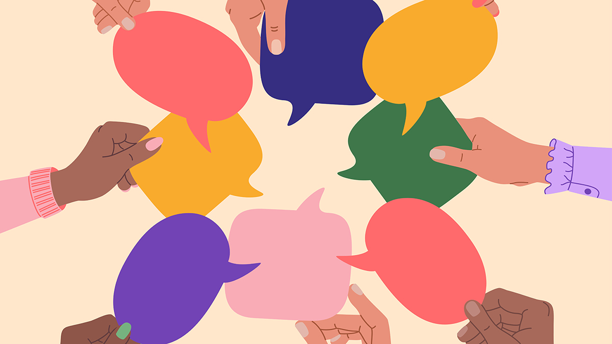 Diverse human hands holding speech bubbles