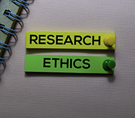 Post-it notes with the words research ethics on