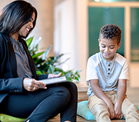 An adult talking to a child
